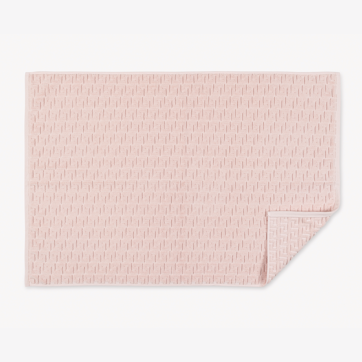 Folded Matouk Schumacher Athena Tubmat in Blush