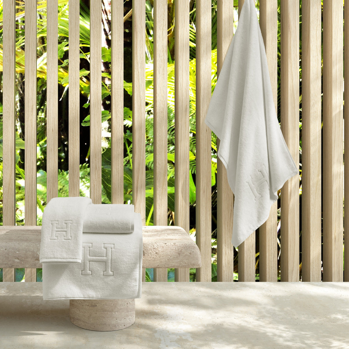 Lifestyle Image of Matouk Auberge Bath Towels Outdoor