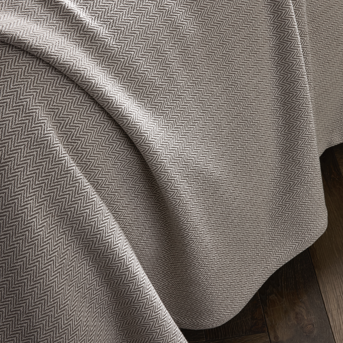 Detail view of Matouk Avalon Blanket in Platinum color