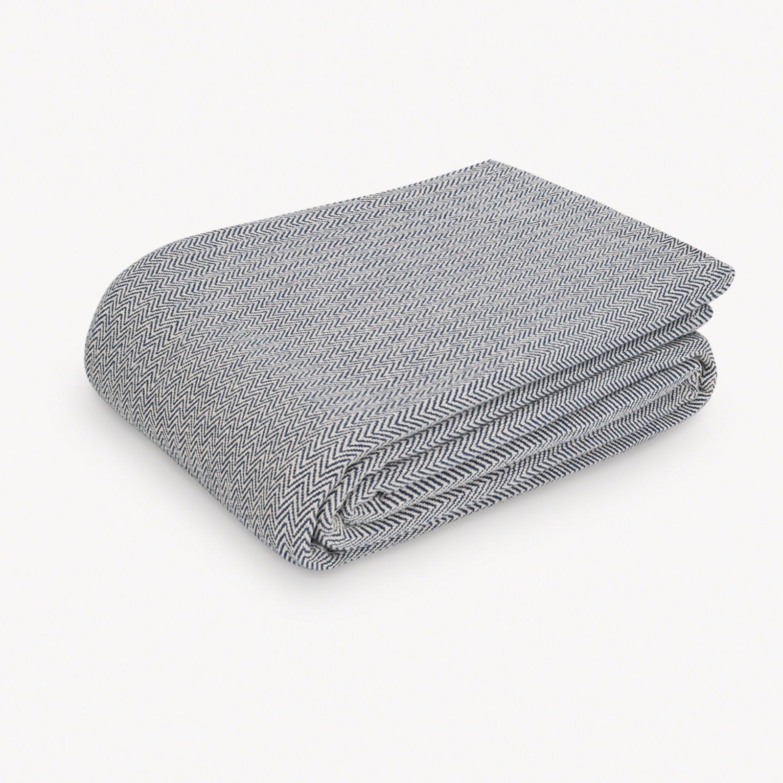Folded Matouk Avalon Blanket in Navy color