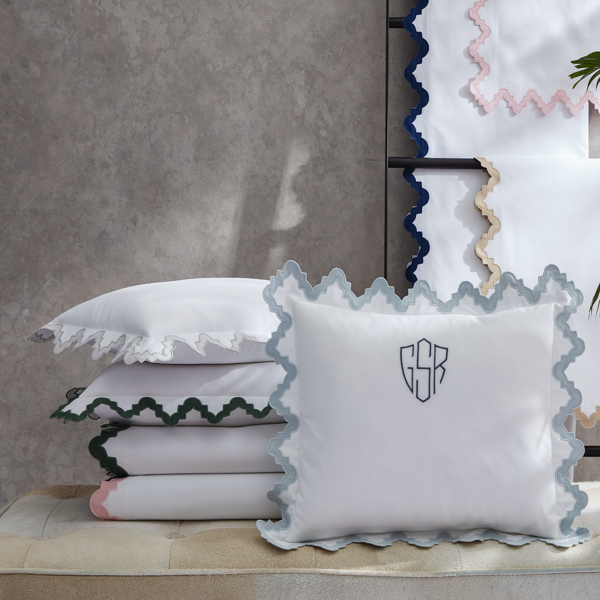 Matouk Aziza Bedding Shams and Duvet Covers Stacked in All Colors