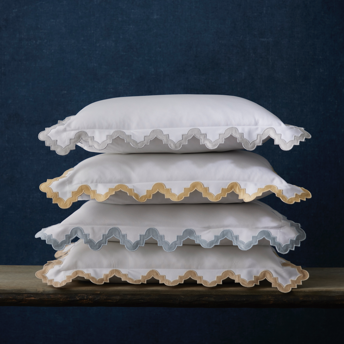 Stack of Matouk Aziza Bedding Shams in Different Color