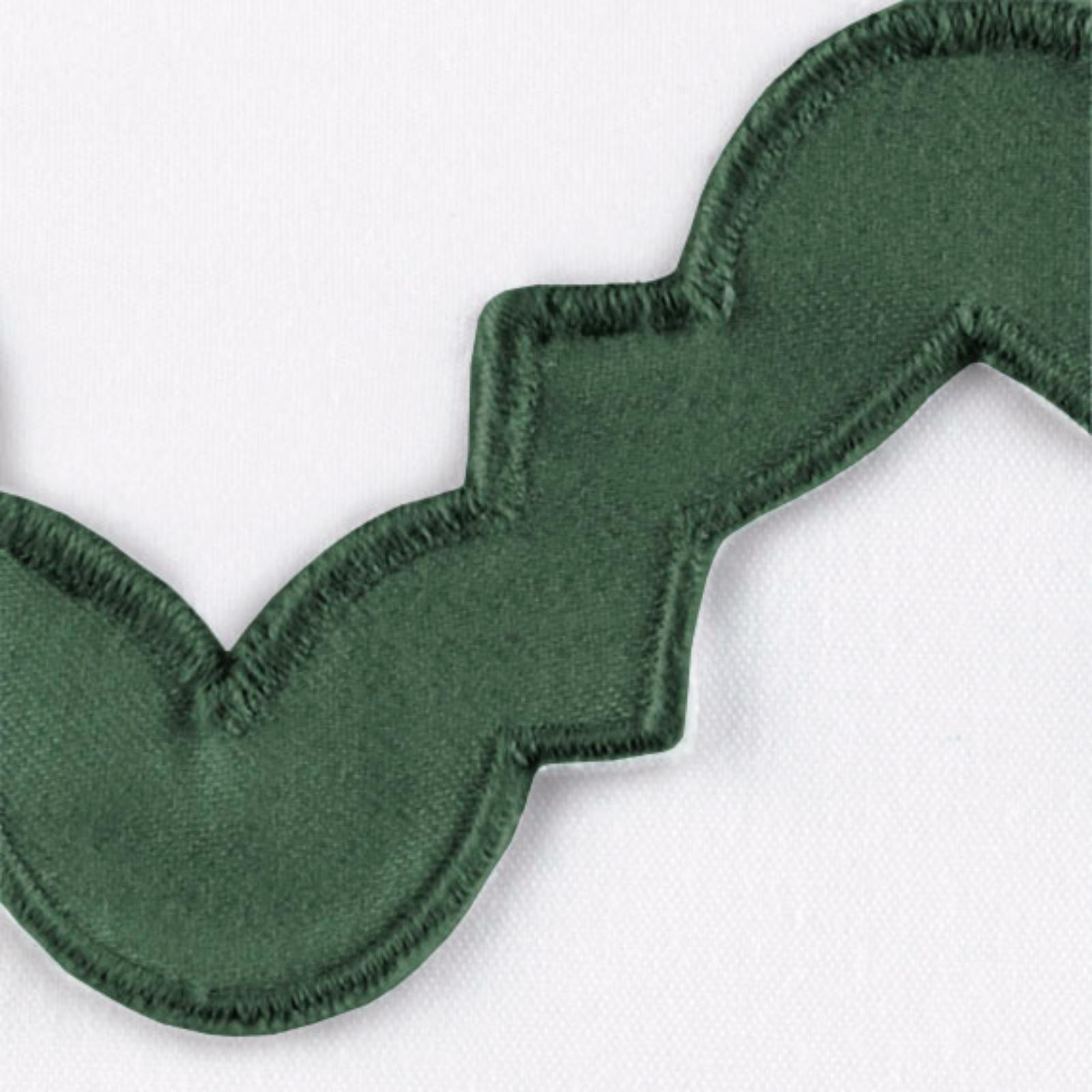 Lifestyle Image of a Full Bed Dressed in Matouk Aziza Bedding in Silver Color with Green Swatch