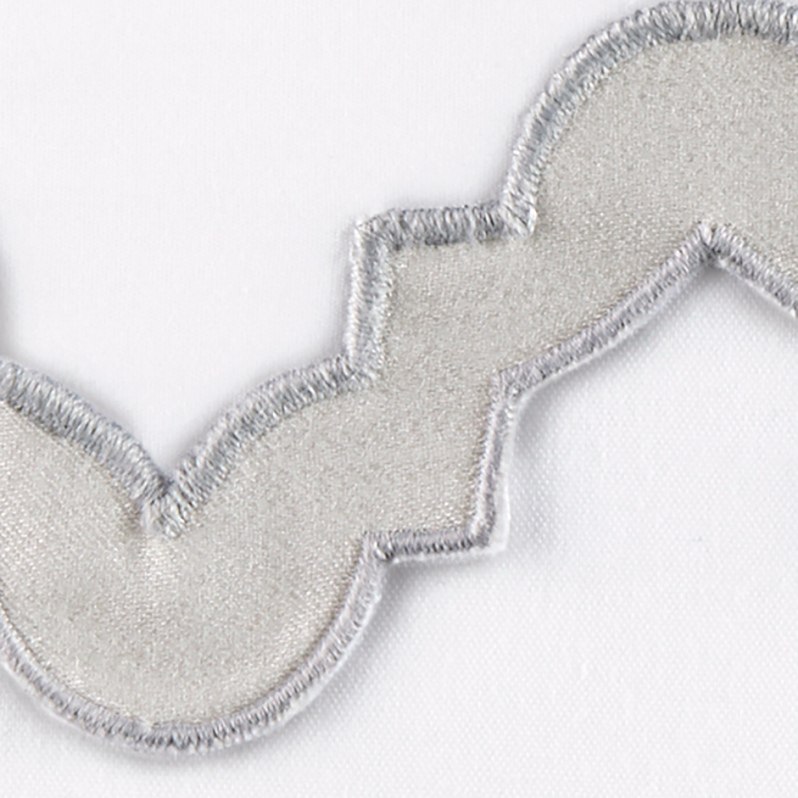 Matouk Aziza Bedding Shams and Duvet Covers Stacked in All Colors