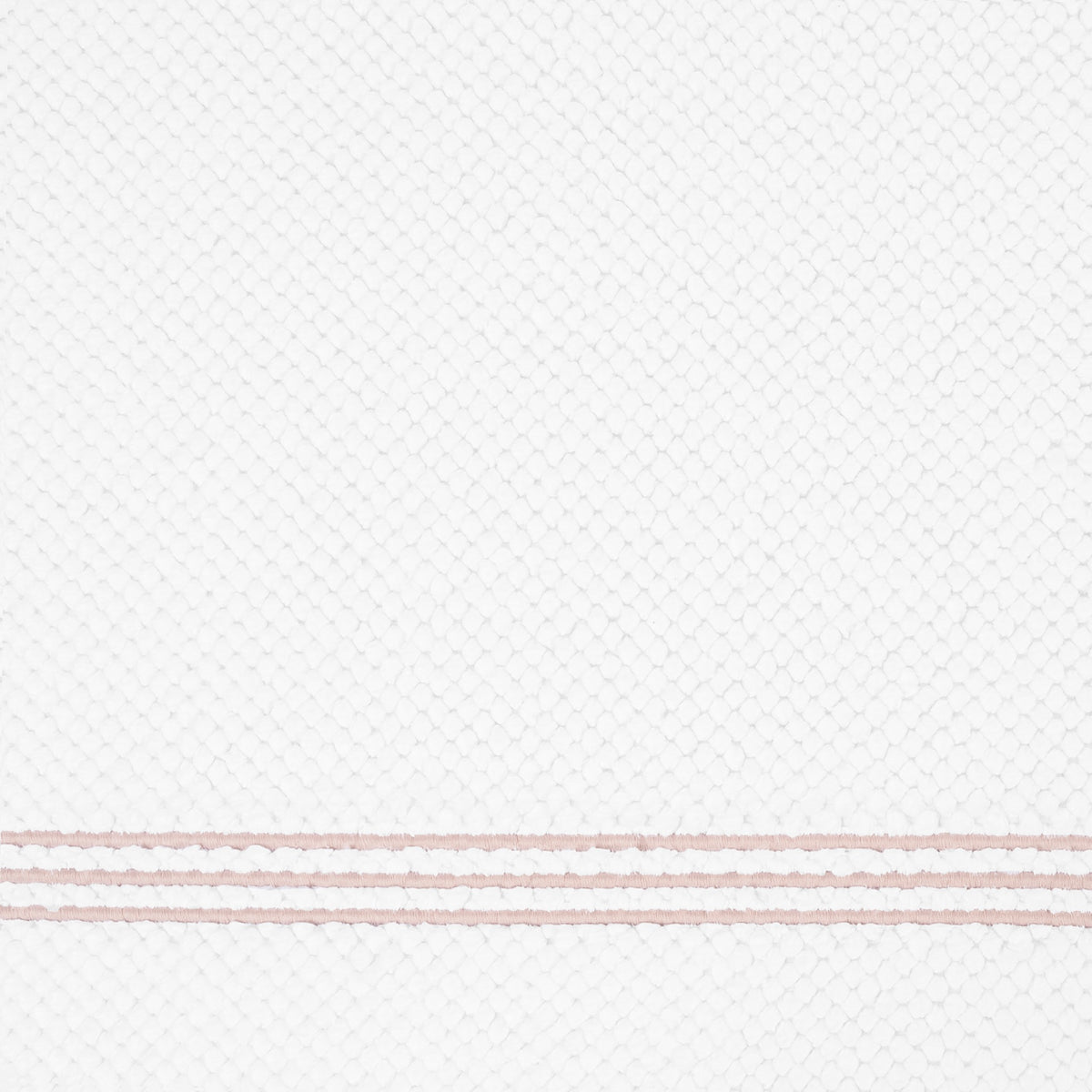 Closeup of Matouk Bel Tempo Bath Rug with Blush Trio Lines