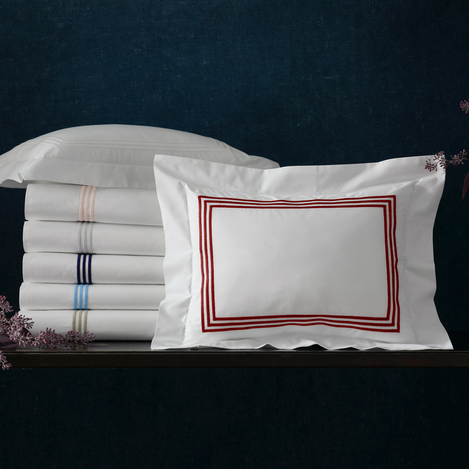 Stack of Matouk Bel Tempo Bedding in All Colors