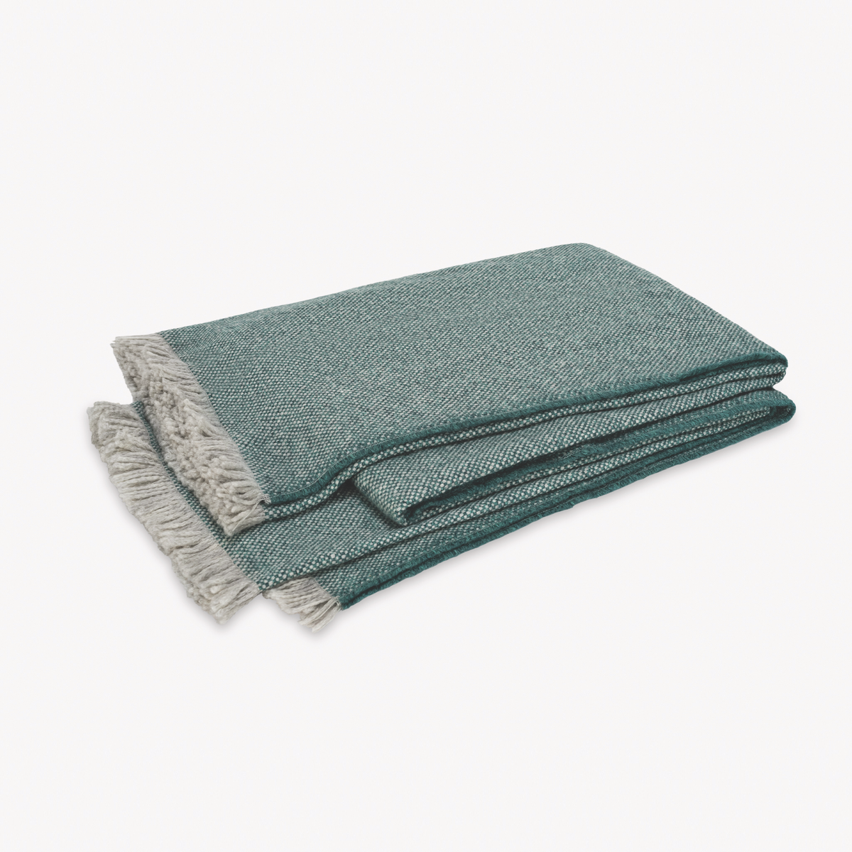 Folded Matouk Bernardo Throw in Jade color