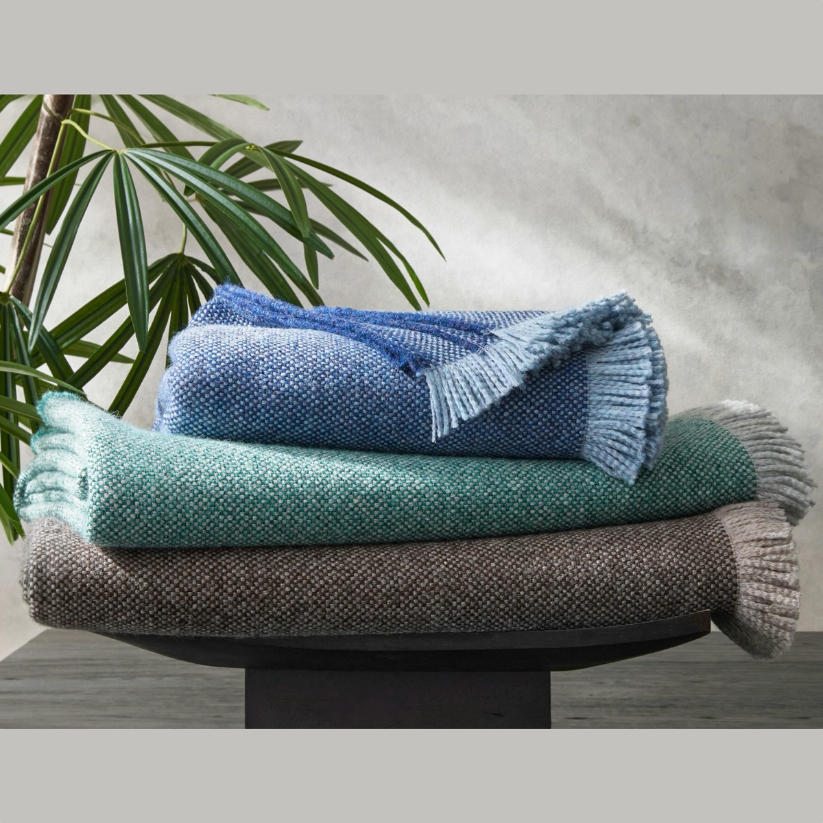 Stack of Matouk Bernardo Throws in 2026 colors