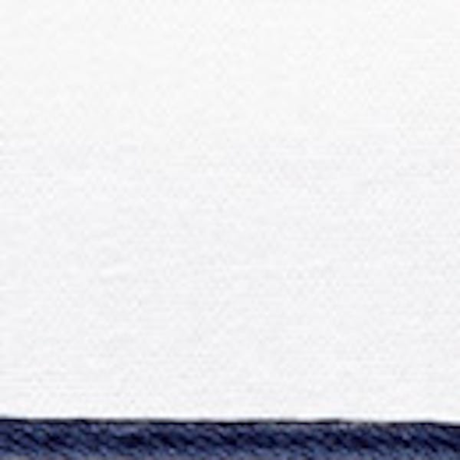 Full Bed Dressed in Matouk Bryant Bedding with Navy Swatch