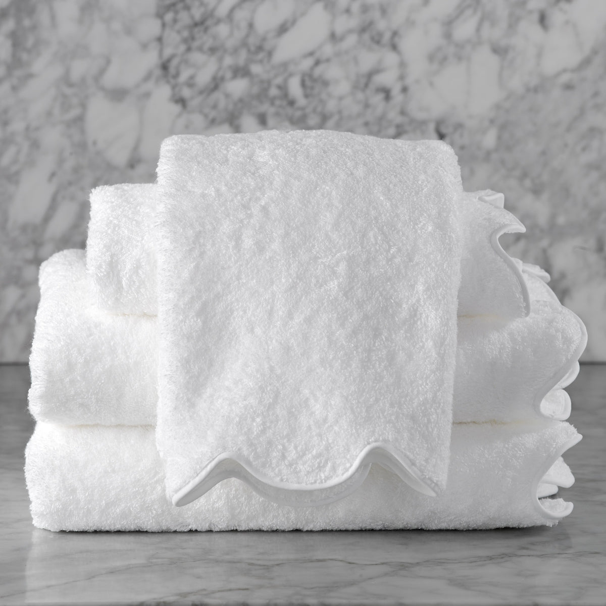 Lifestyle Shot of Matouk Cairo Scallop Bath Towels in White Color
