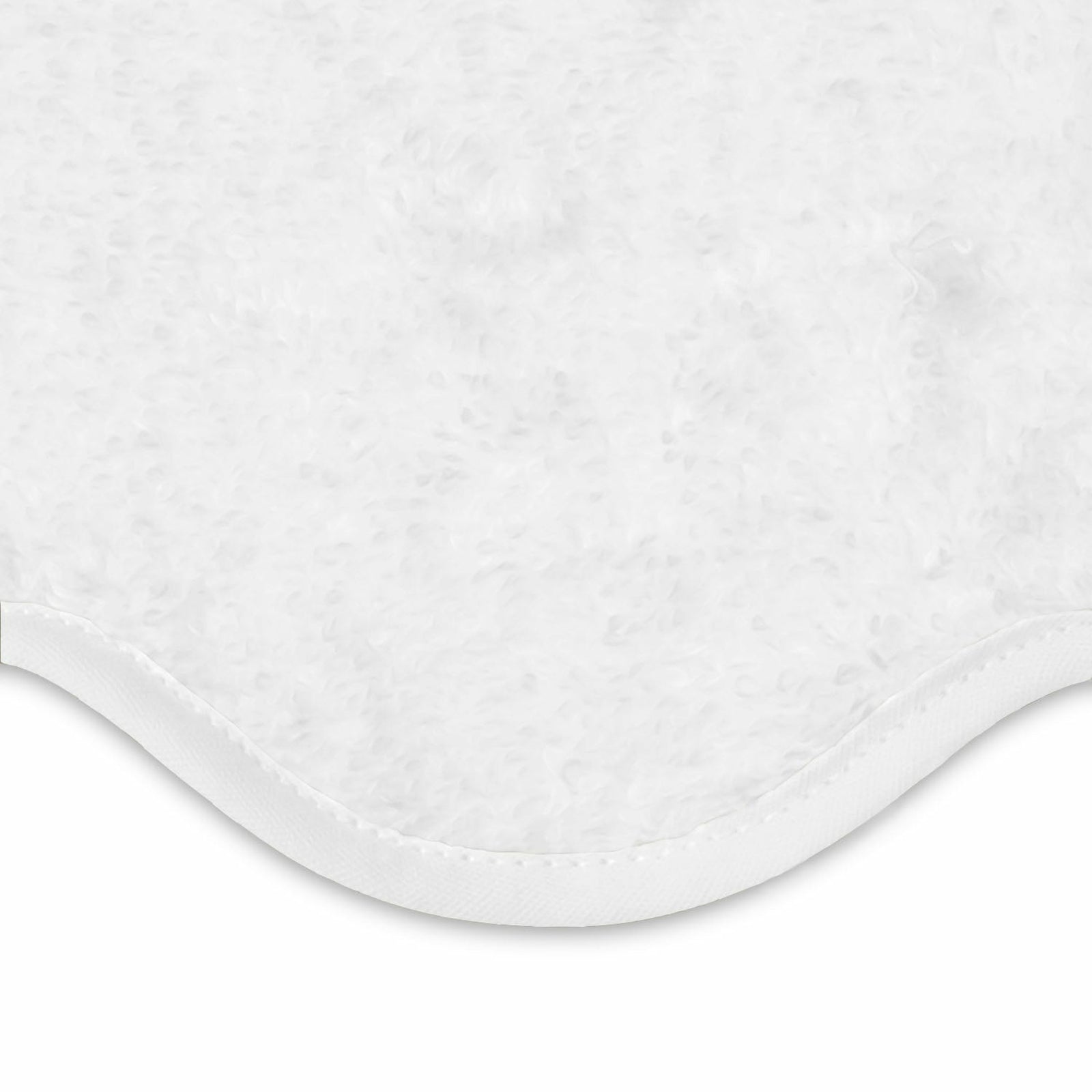 Stack of Matouk Cairo Scallop Bath Towels and Mats in Different Colors