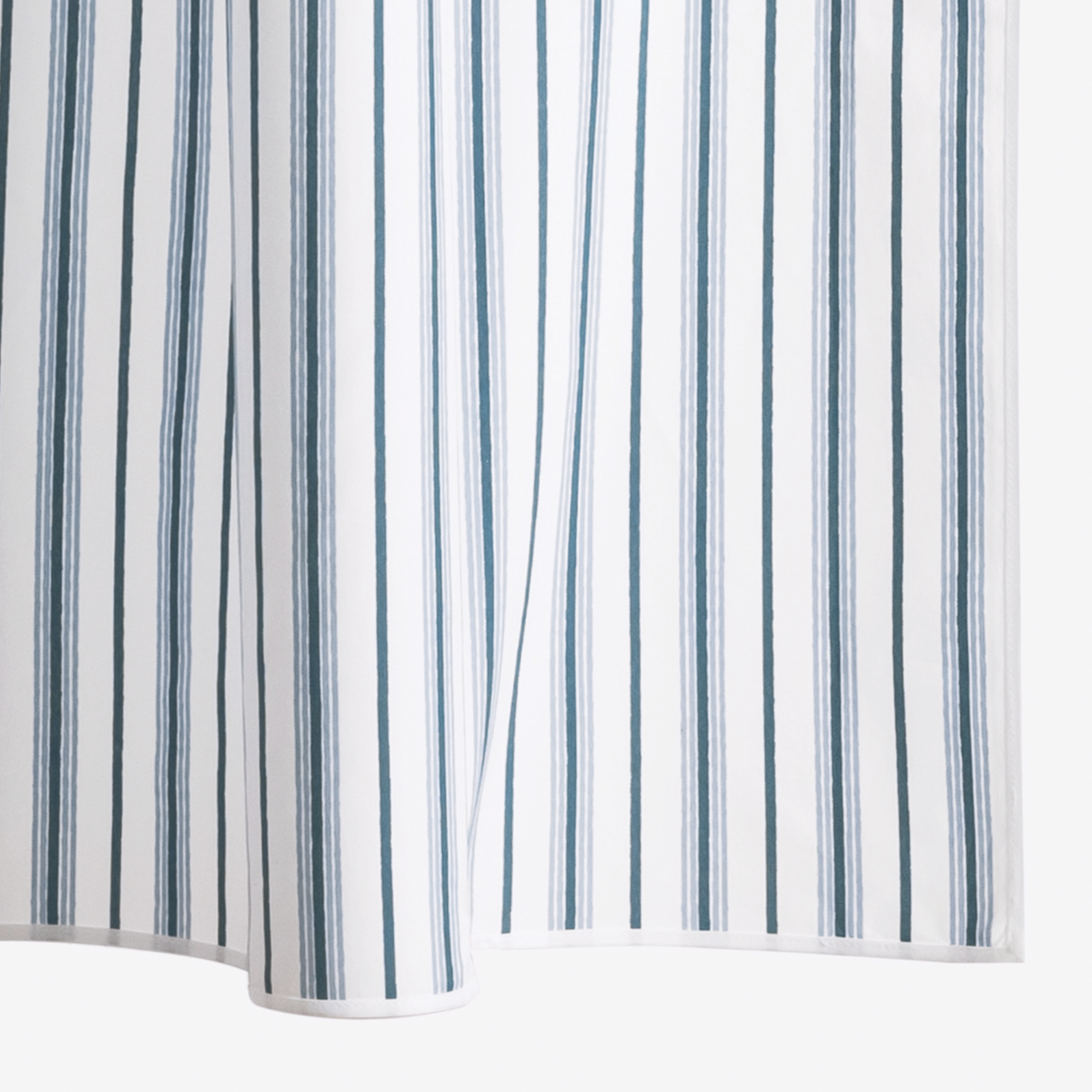 Closeup of Prussian Blue Matouk Calypso Shower Curtains in the Egyptian cotton percale fabric