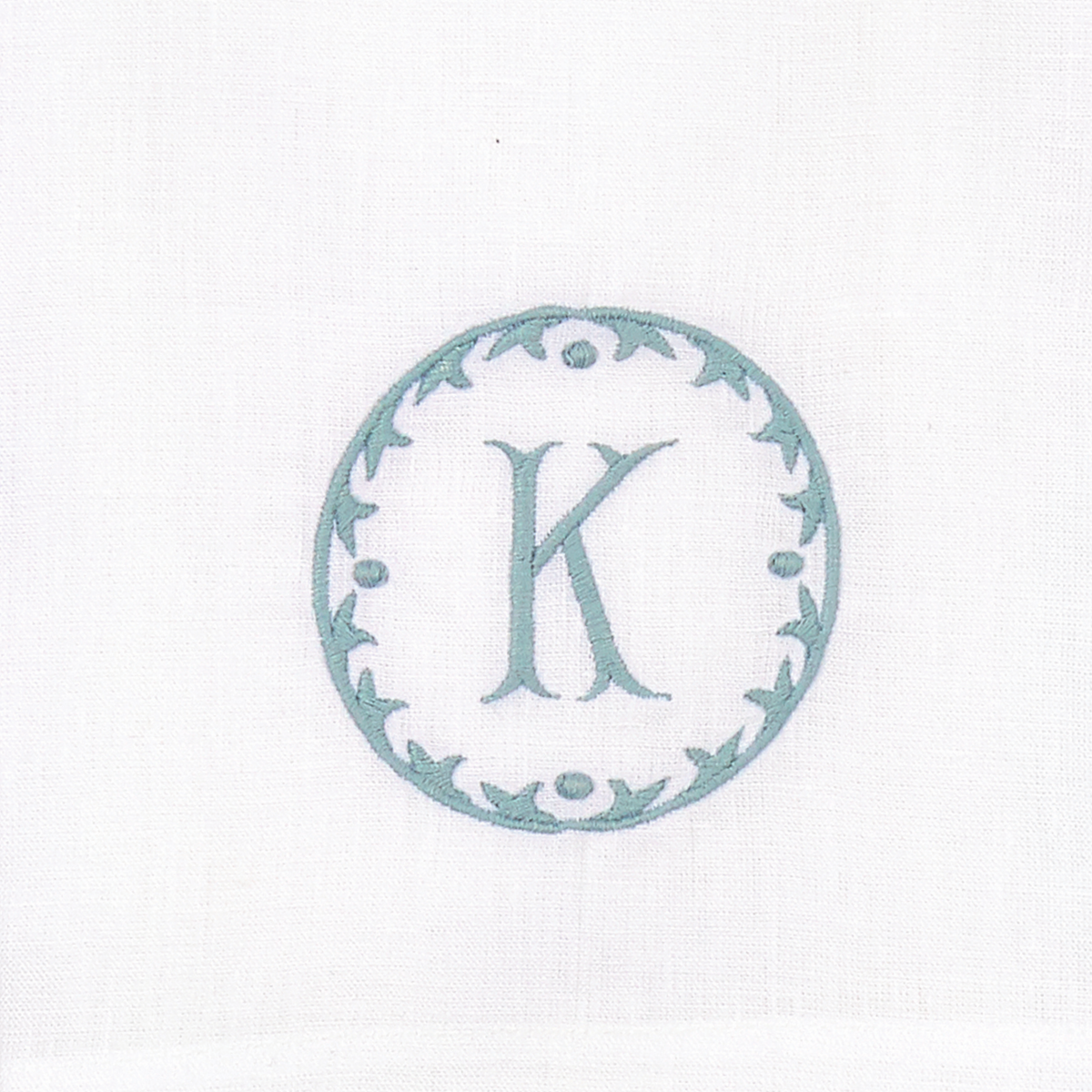 Closeup of Matouk Carta Guest Towels Letter K