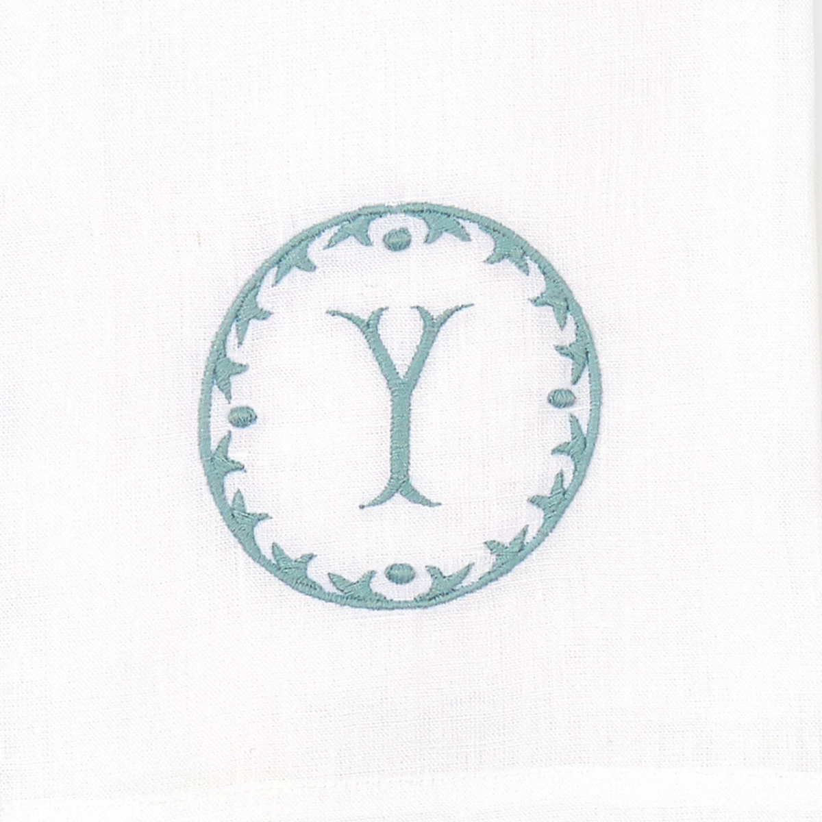 Closeup of Matouk Carta Guest Towels Letter Y