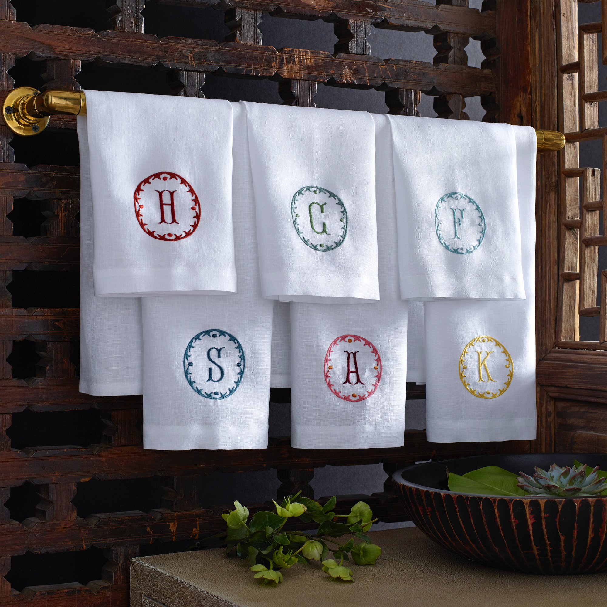 Hanging Matouk Carta Guest Towels in Different Colors and Letters