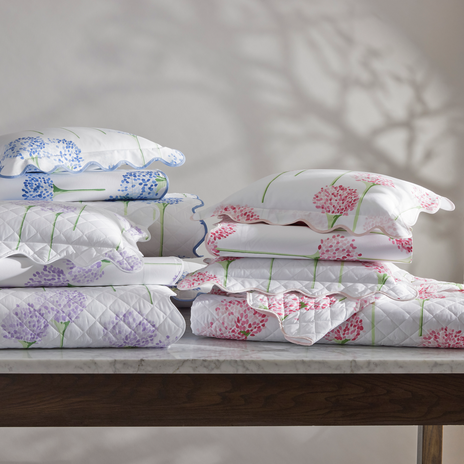 Stack of Matouk Charlotte Bedding in 2025 colors