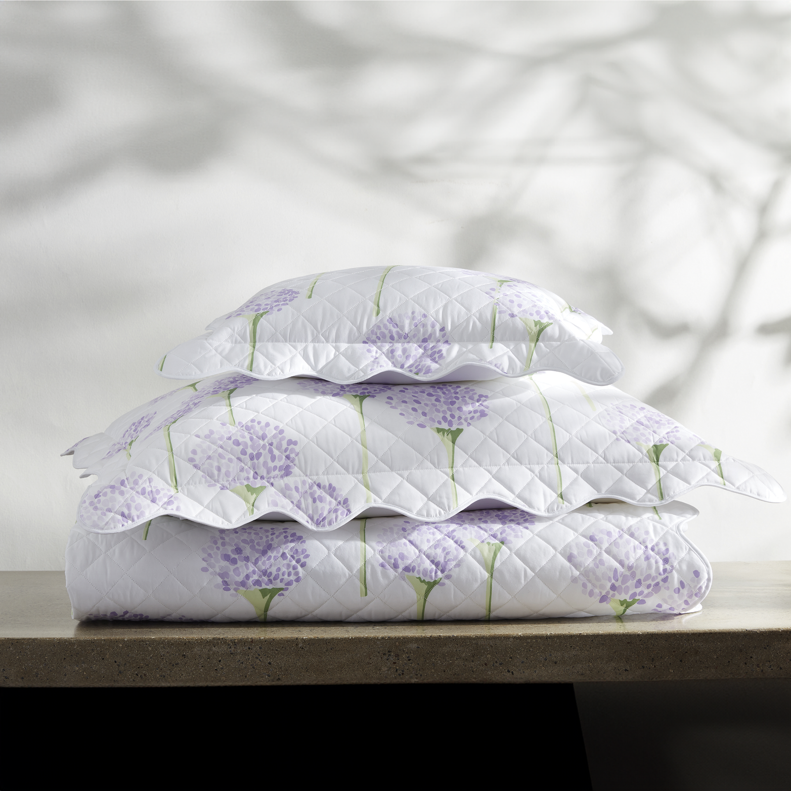 Stack of Matouk Charlotte Bedding in Lavender
