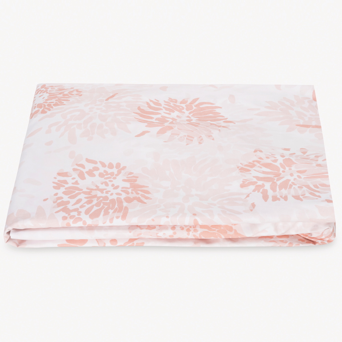 A folded fitted sheet in Egyptian cotton percale with Blush floral pattern from Matouk Chrysanthemum Collection
