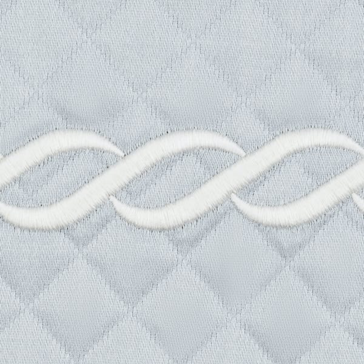 Detail Closeup of Matouk Classic Chain Scallop Matelassé Bedding Swatch in Pool/Bone Color