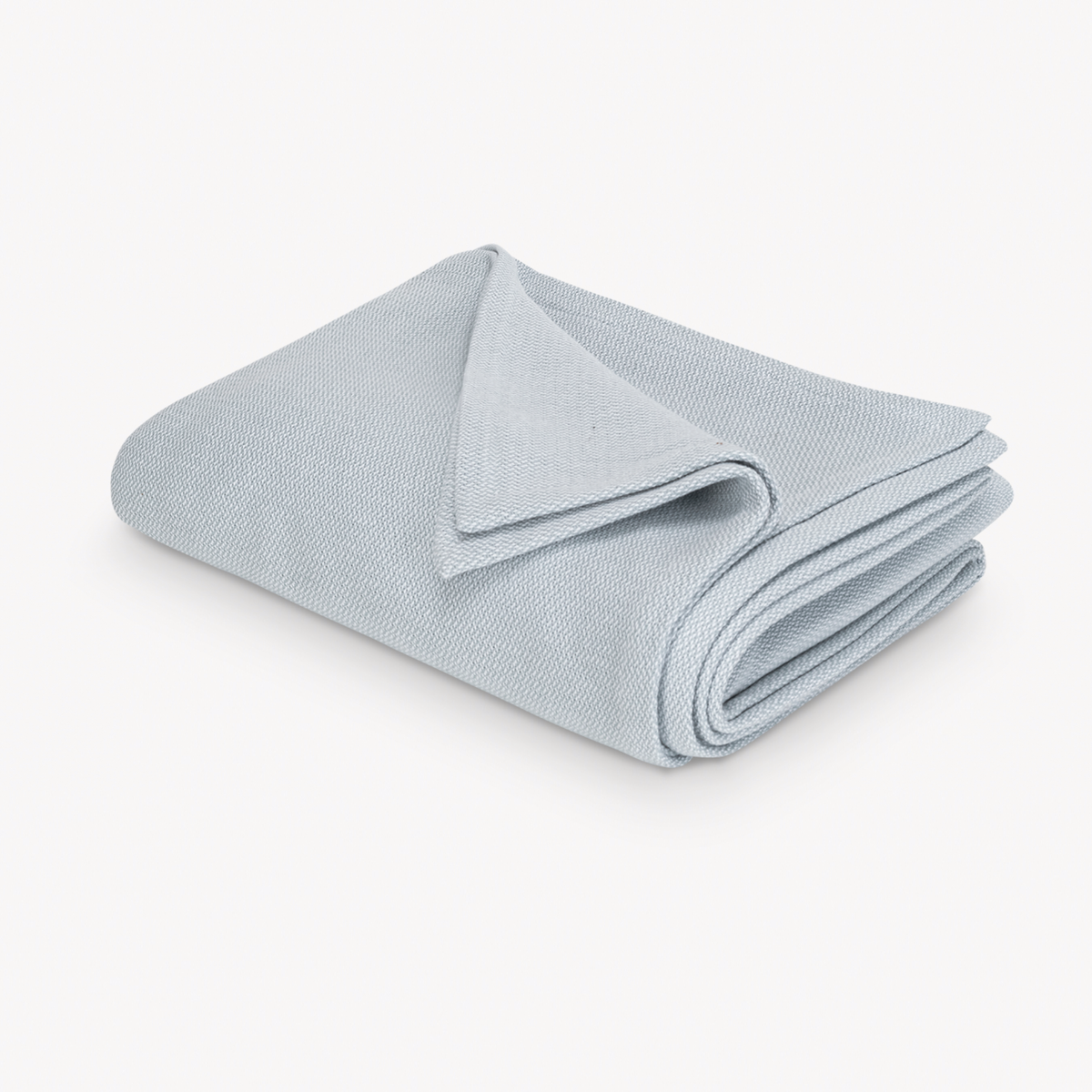 Folded Matouk Costa Mesa Blanket in Pool