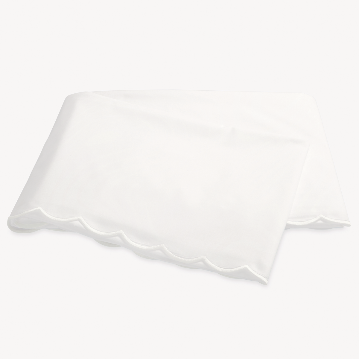 Folded Flat Sheet of Matouk Dakota Bedding in Bone and Bone color