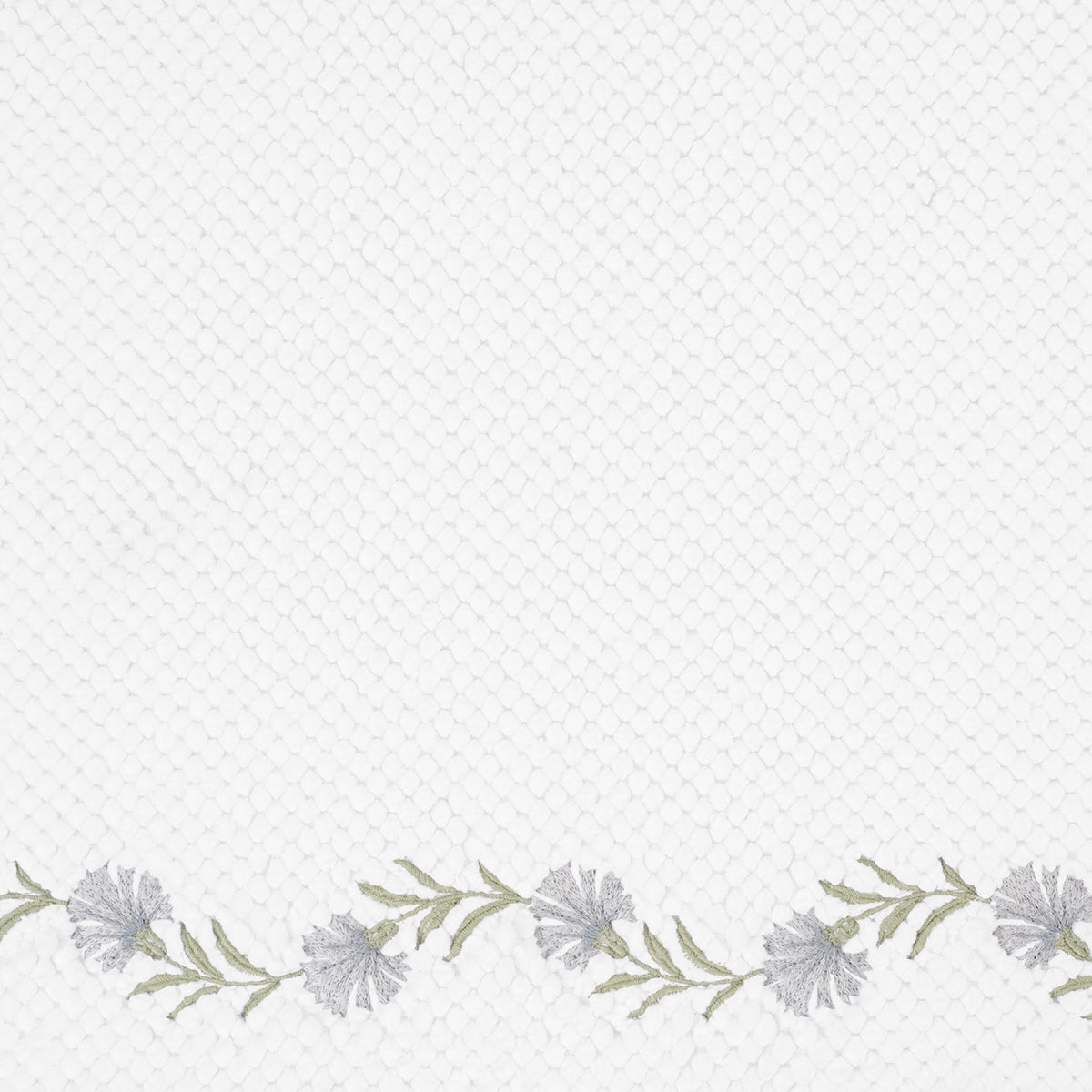 Closeup of Matouk Daphne Bath Rug with Sterling Color Embroidery