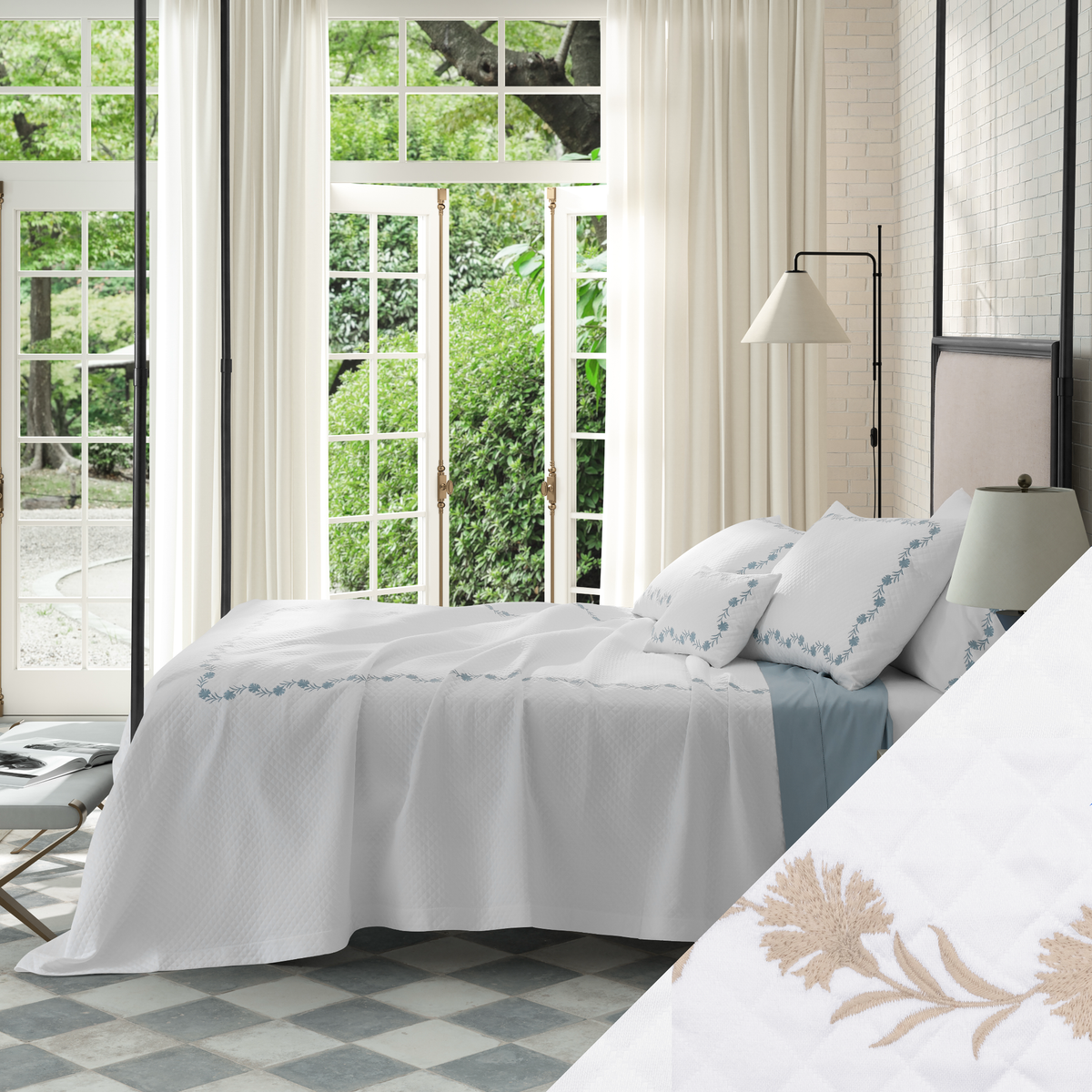 Bed in Matouk Daphne Matelasse Bedding with Dune design and a view of greenery outside