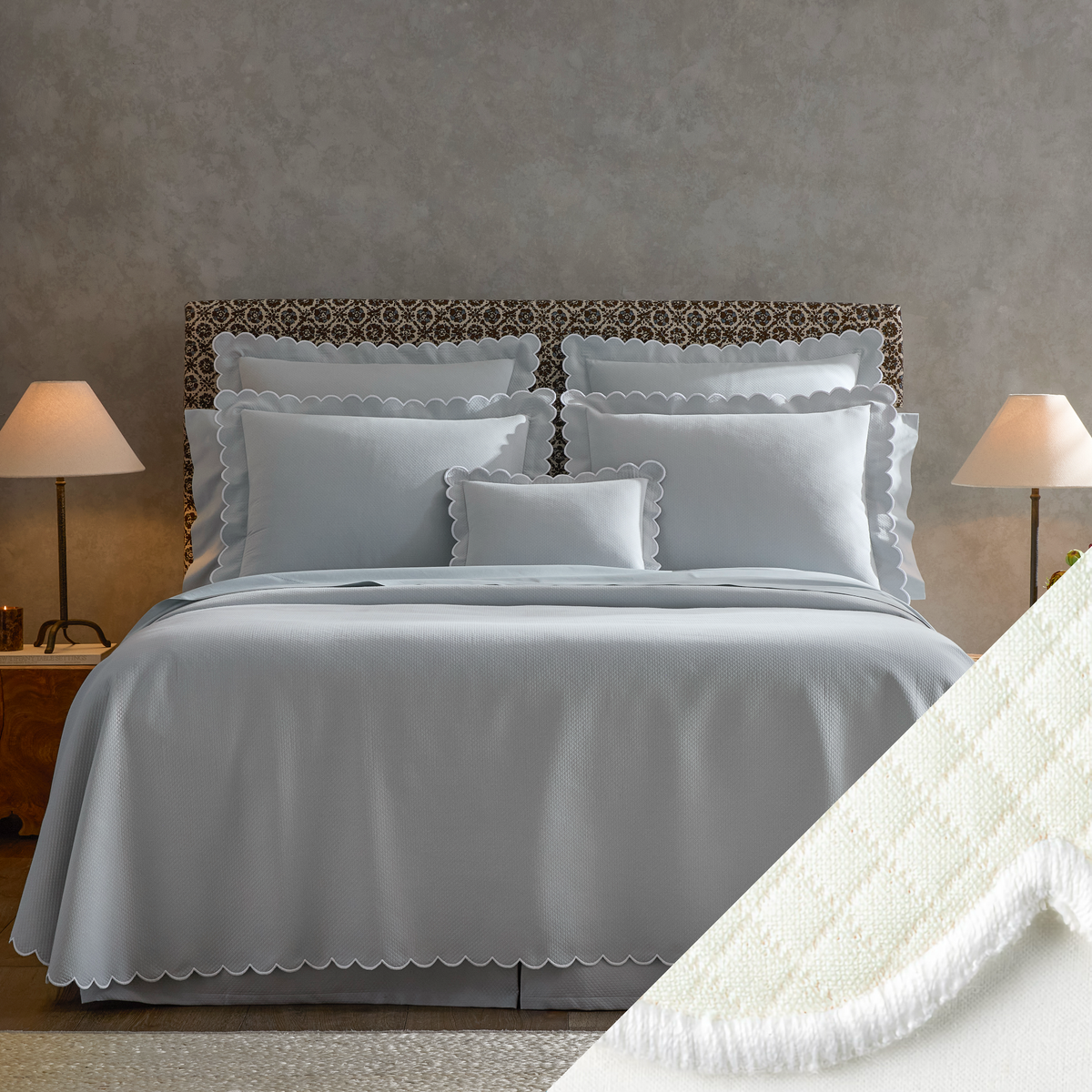  neatly made bed with Matouk Diamond Pique Bedding, two lamps on nightstands, and a close-up of Bone swatch