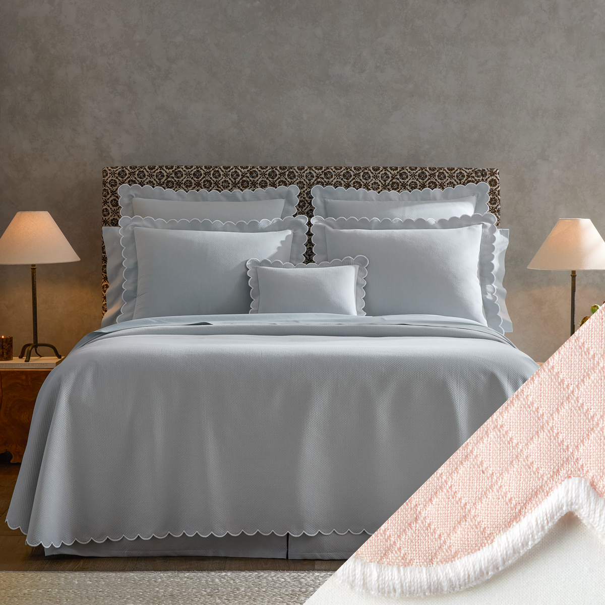  neatly made bed with Matouk Diamond Pique Bedding, two lamps on nightstands, and a close-up of Pink swatch