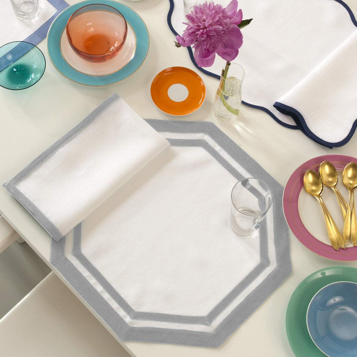 Lifestyle Shot of Matouk Double Border Placemats in Color Classic Grey