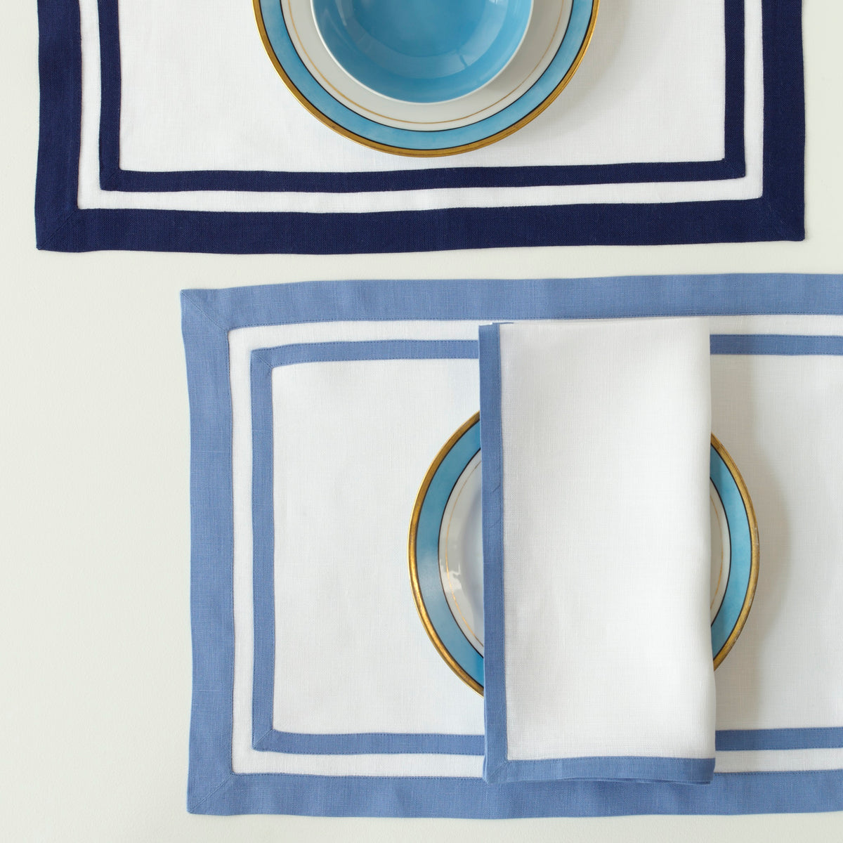 Matouk Double Border Placemats in Color Sapphire and Sky Blue