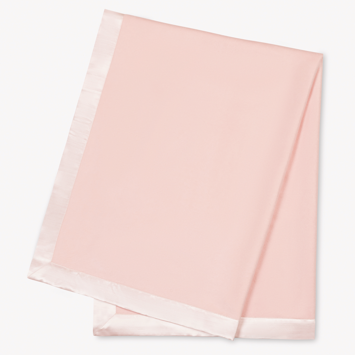 Blush Matouk Dream Modal Little Blanket folded and laid flat on a white background