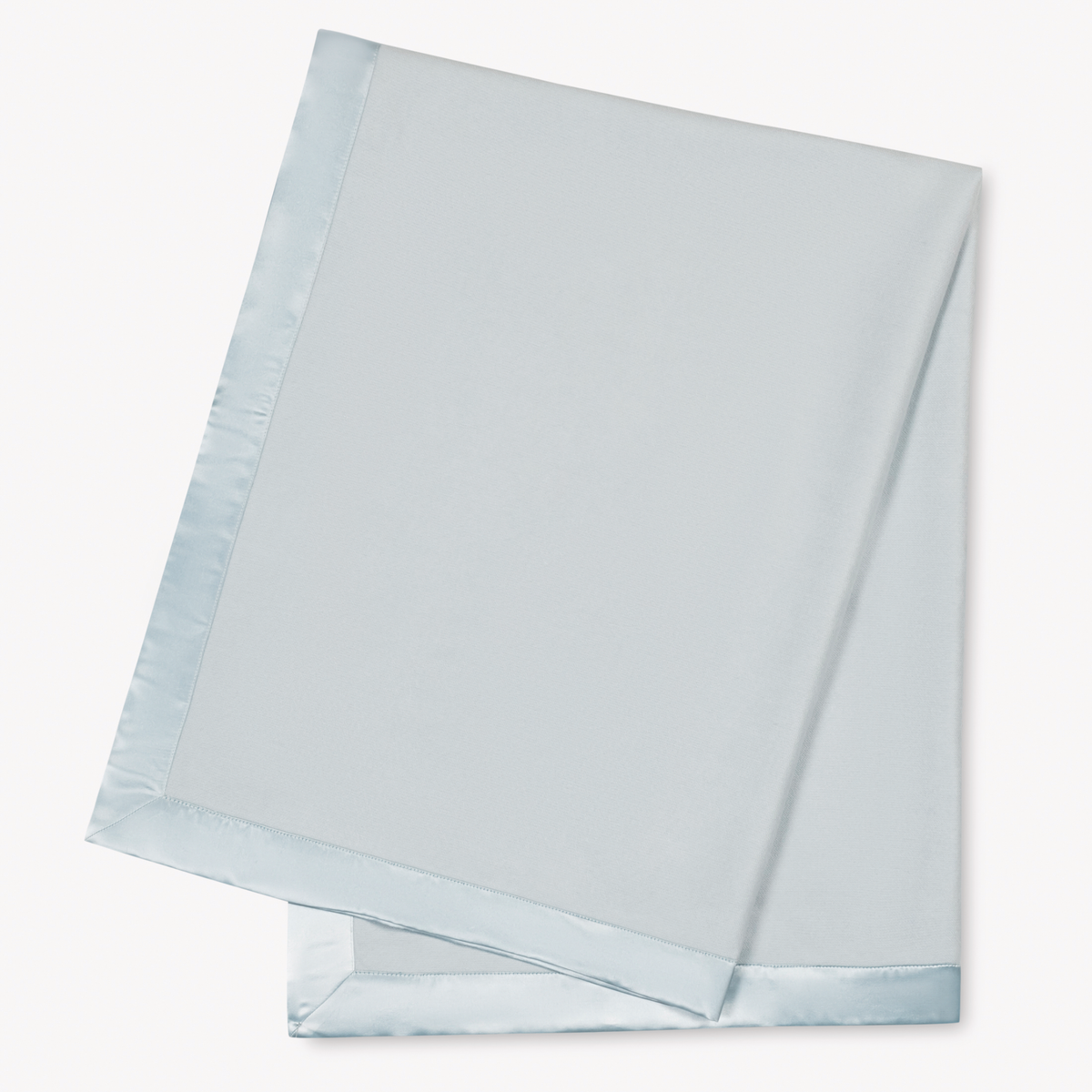 Pool Matouk Dream Modal Little Blanket folded and laid flat on a white background