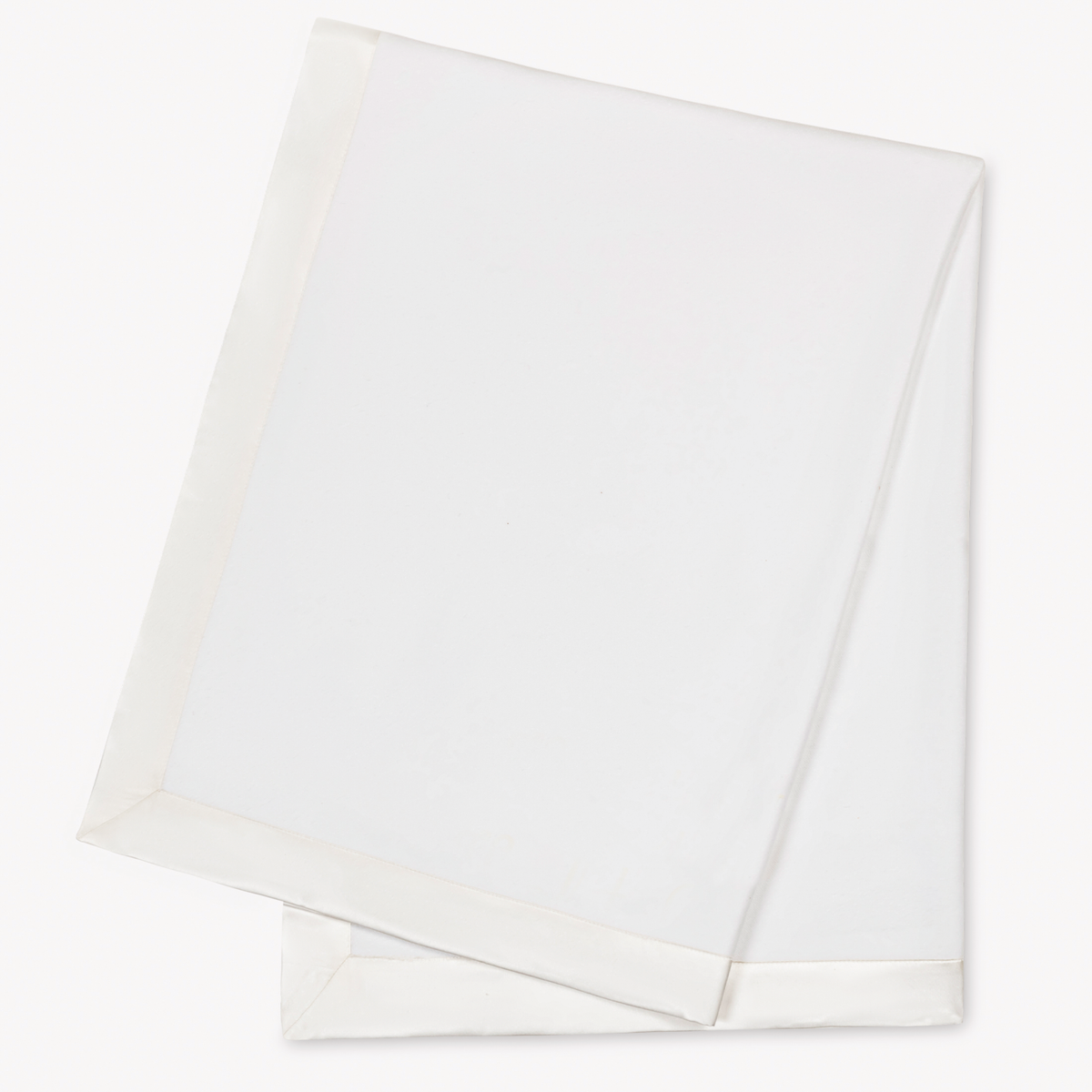 White Matouk Dream Modal Little Blanket folded and laid flat on a white background