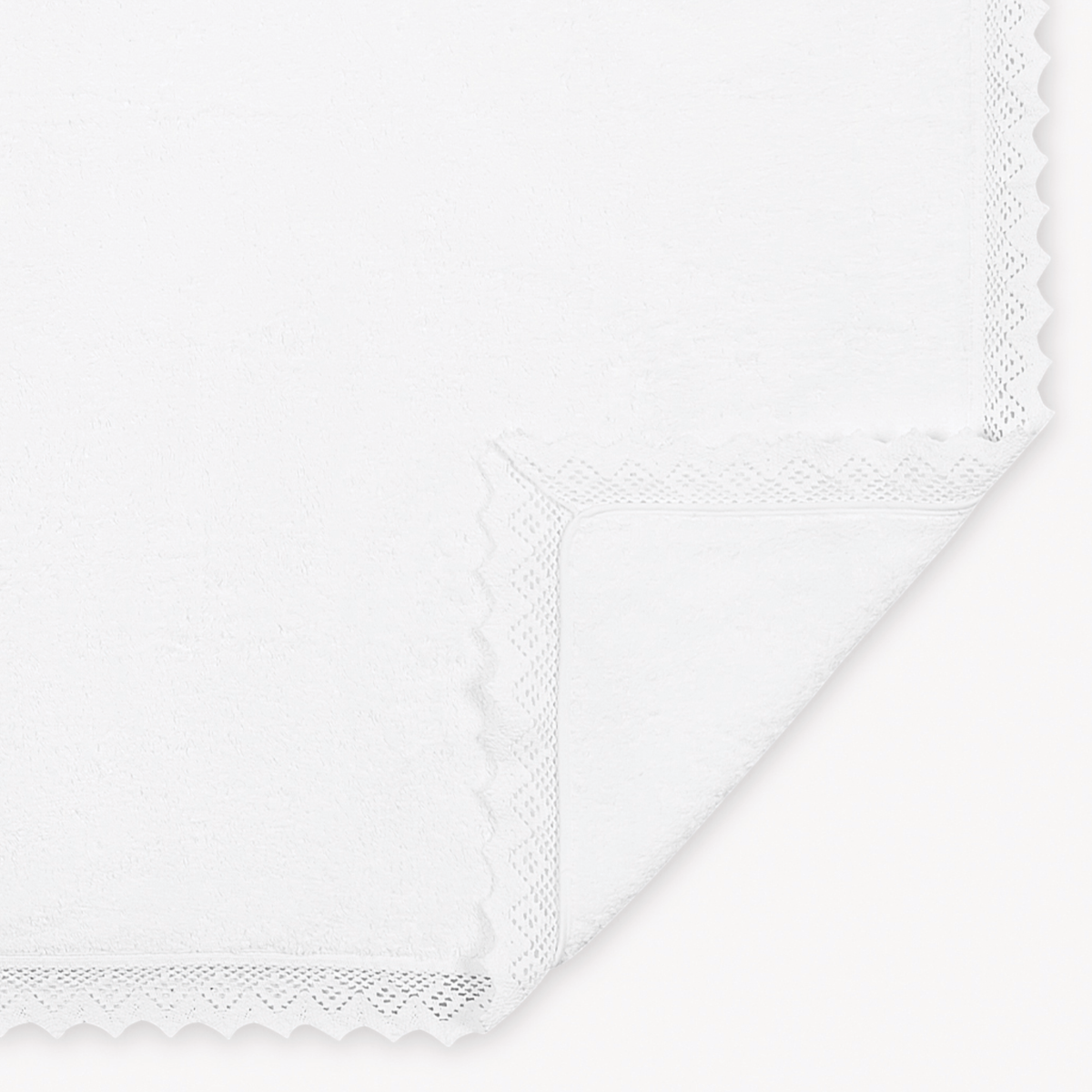 Fabric Closeup of White Matouk Ellis Bath Towels and Rugs