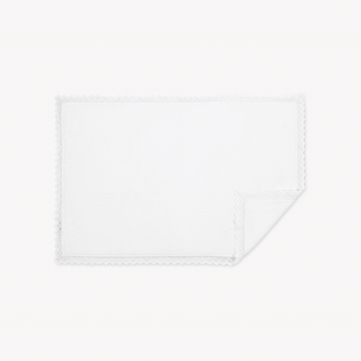 Tubmat of White Matouk Ellis Bath Collection