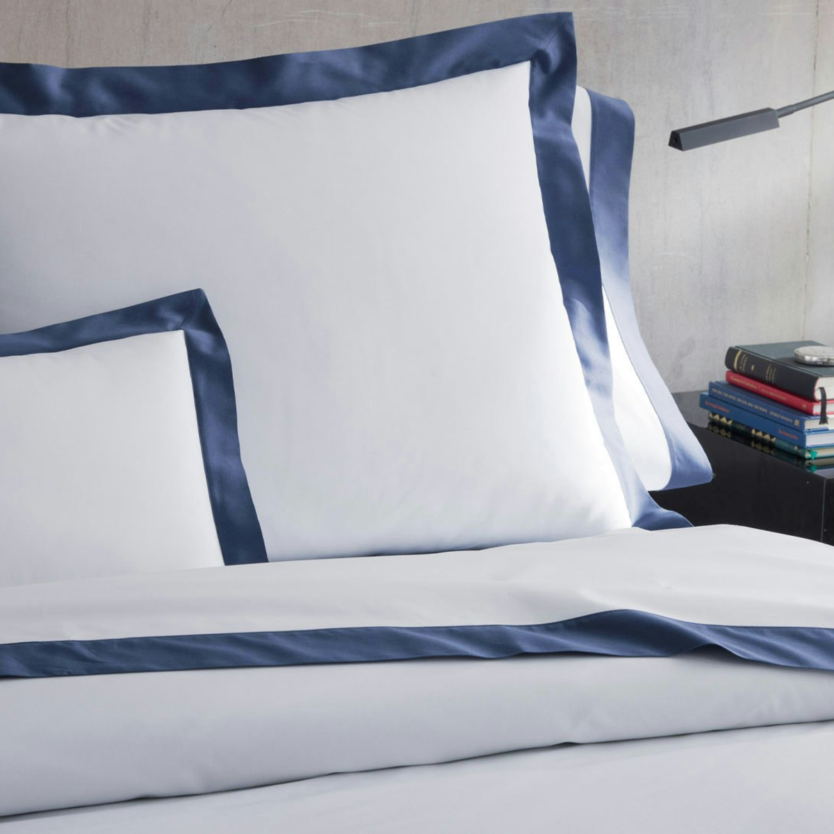 Closeup of Matouk Emory Bedding Shams in Steel Blue color