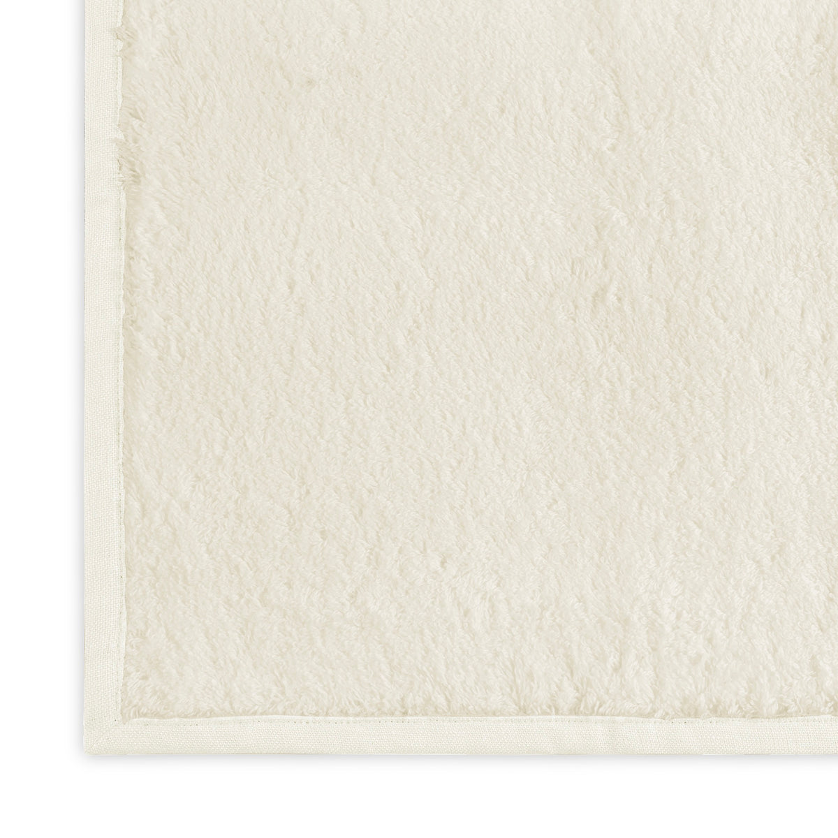 Close-up of Ivory Ivory Matouk Enzo Bath Towel Corner