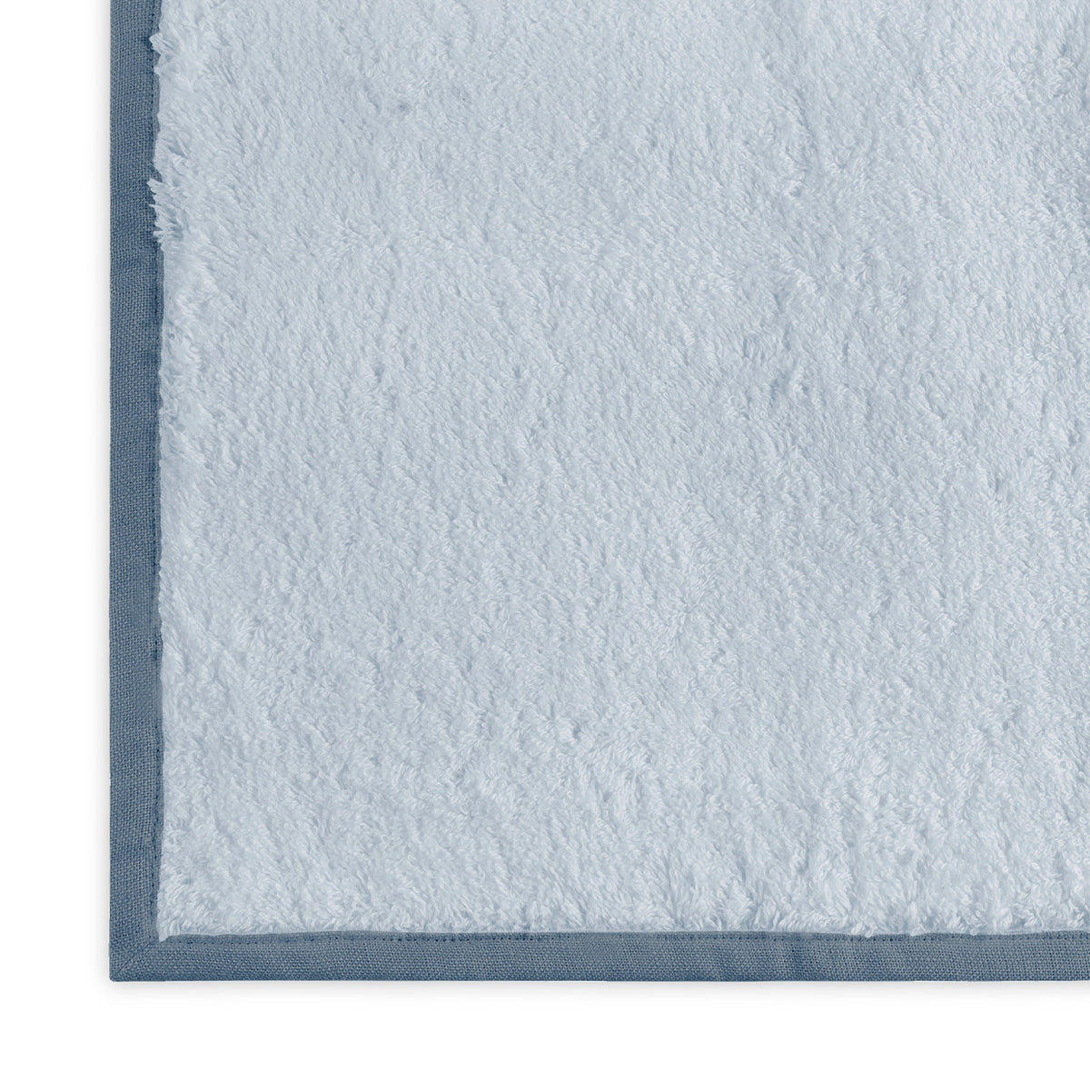 Close-up of Light Blue Sea Matouk Enzo Bath Towel Corner