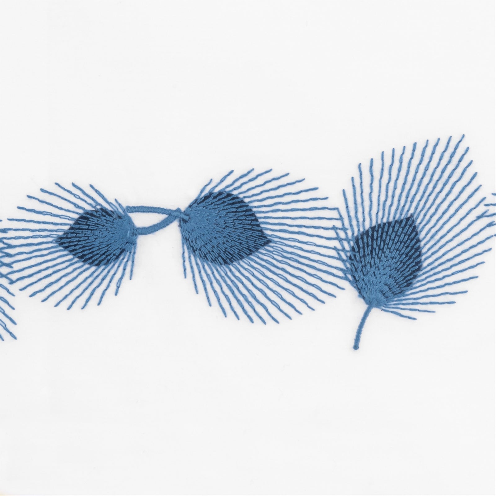 Full Bed Dressed in Matouk Feather Bedding with Swatch in Navy Color