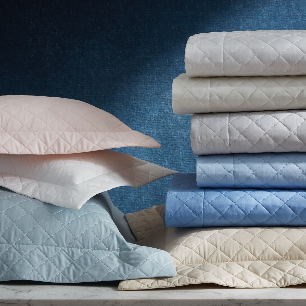 Stack of Matouk Gemma Bedding in All Colors