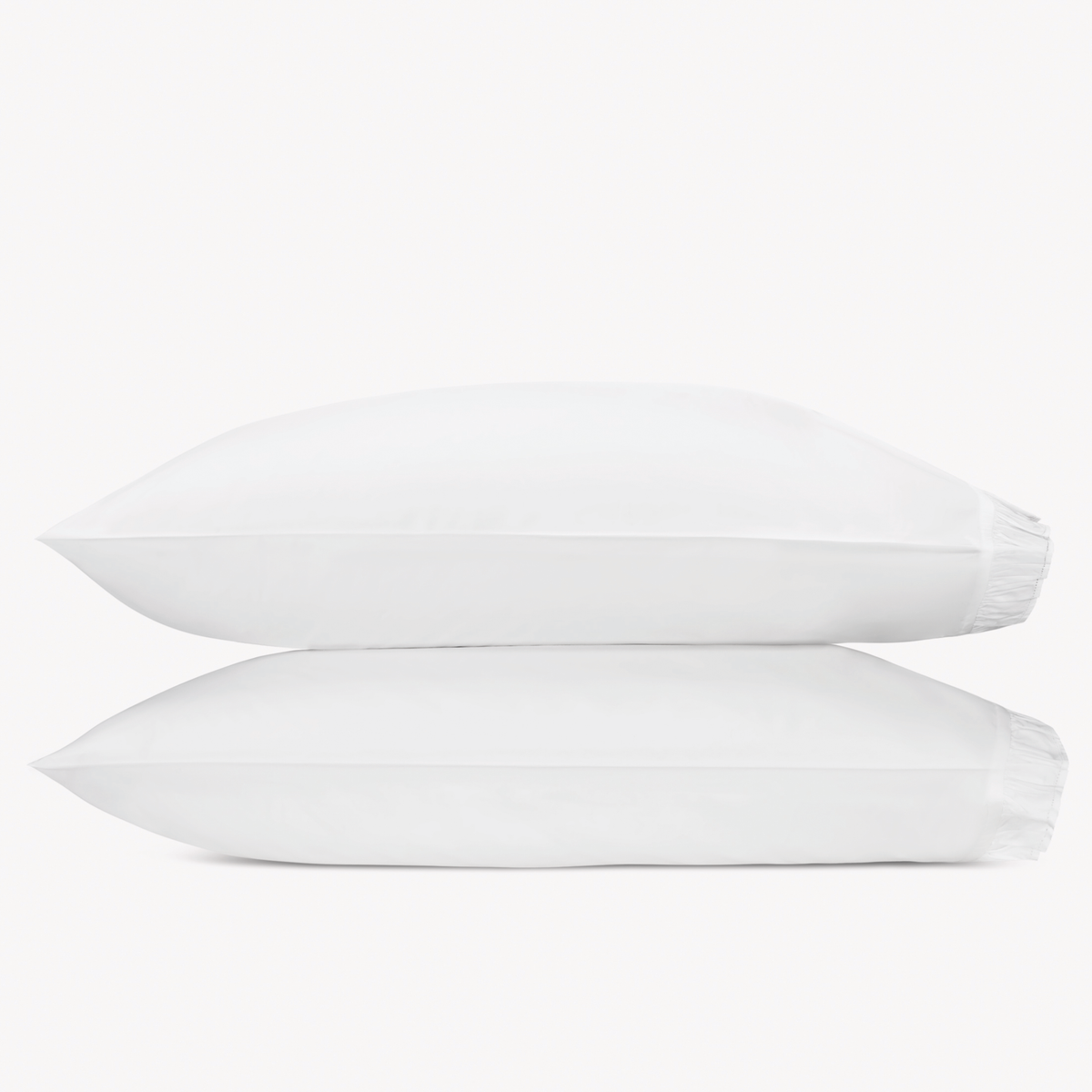 Two white pillows from the Matouk Georgia Collection stacked against a plain white background.