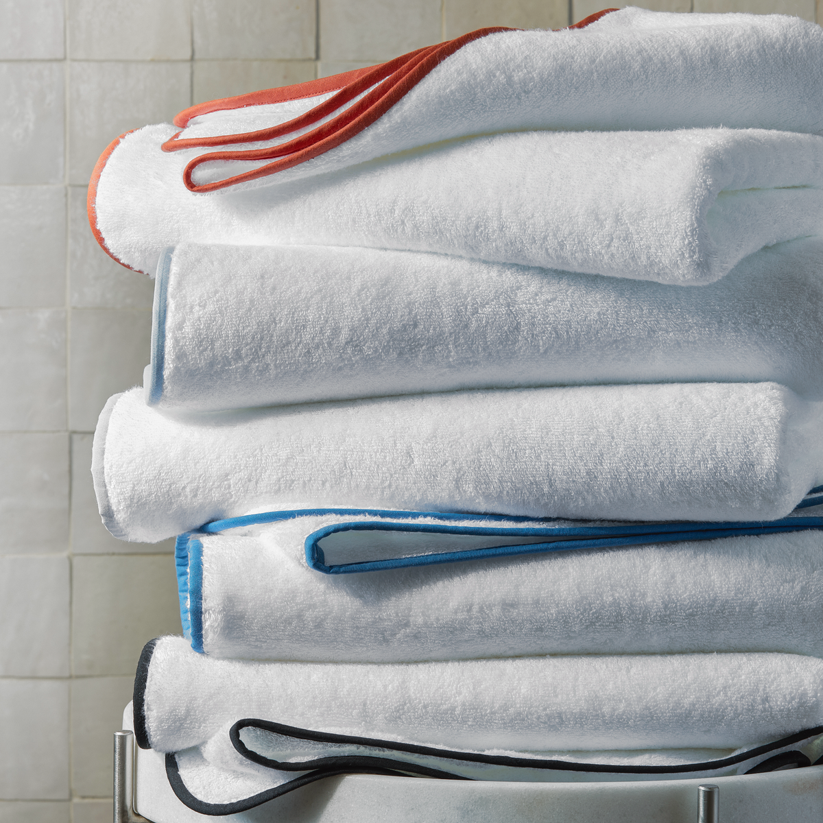 Stack of Matouk Giza Bath Towels in Different Colors