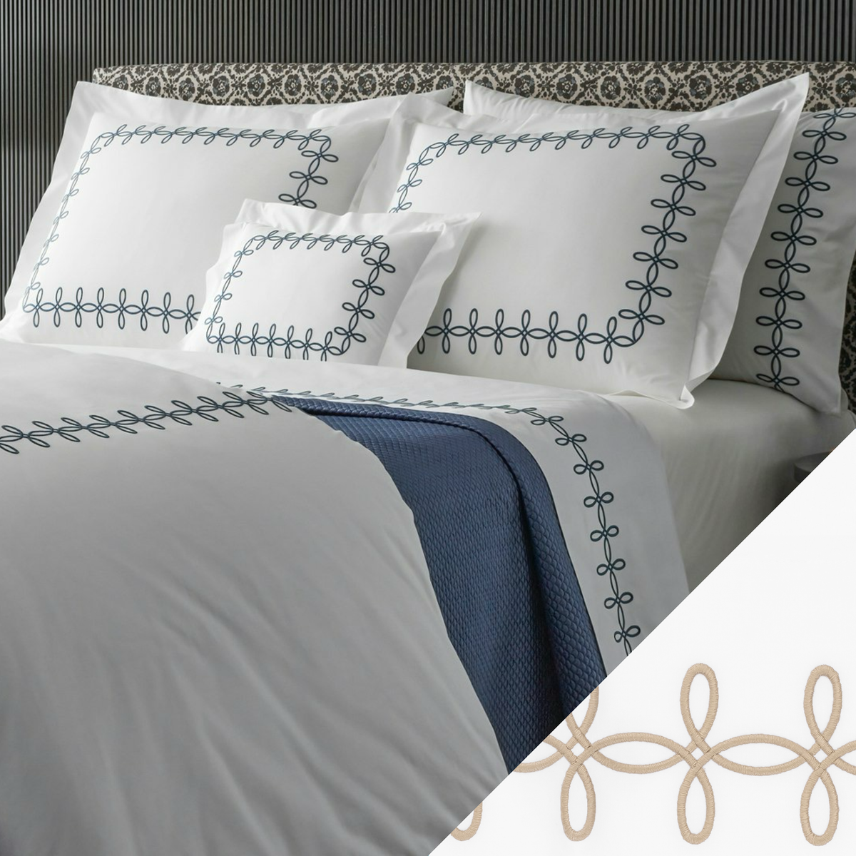 A neatly made bed with Matouk Gordian Knot Bedding, Baltic color embroidery, and a Truffle swatch