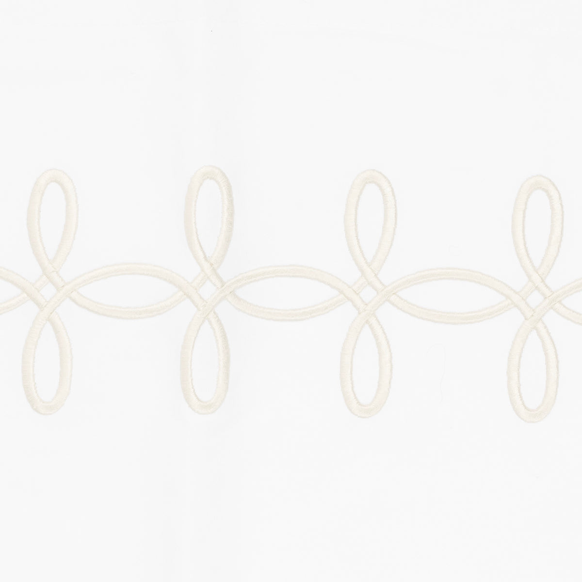 Cream color Matouk Gordian Knot Embroidery Detail on white Egyptian cotton percale