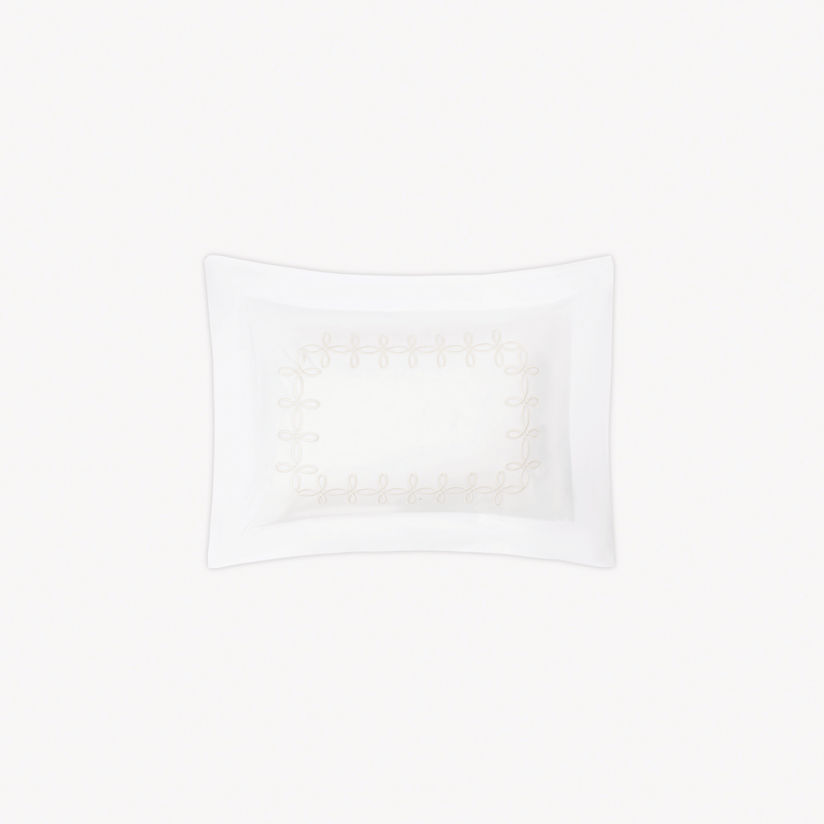 Boudoir Sham of Matouk Gordian Knot bedding in Cream color, set against a plain white background