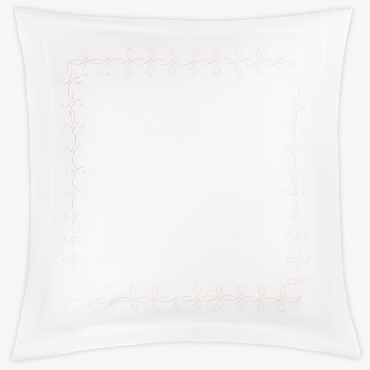 Euro Sham of Matouk Gordian Knot bedding in Cream color, set against a plain white background