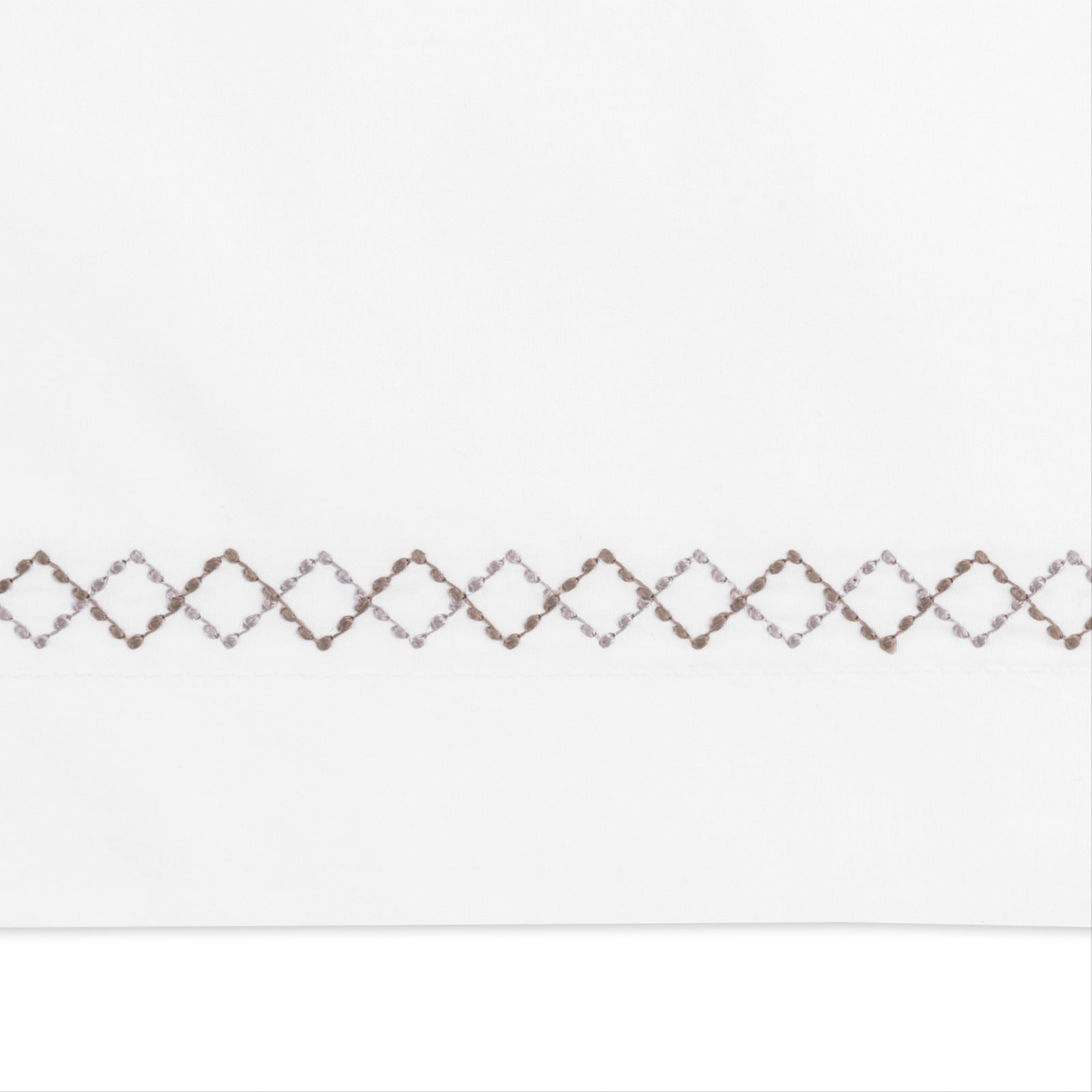 Full Bed Dressed in Matouk Hatch Bedding with Swatch in Oak Color