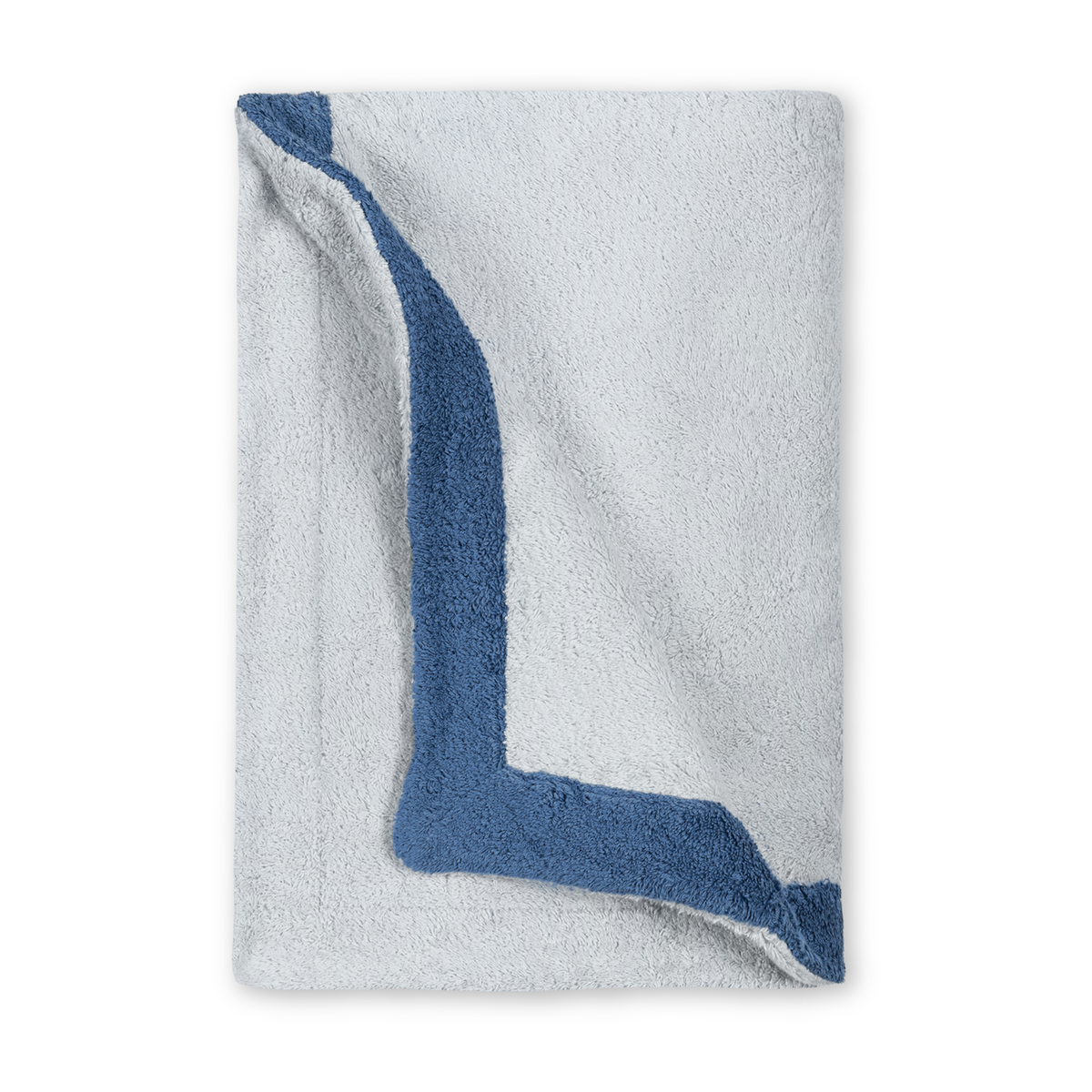 Folded Matouk Helios Beach Towels in Light Blue/Sea Color