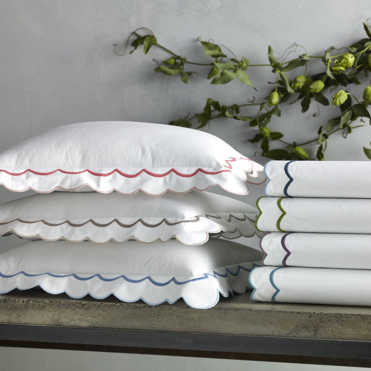 Stack of Matouk India Bedding Fine Linens in All Colors